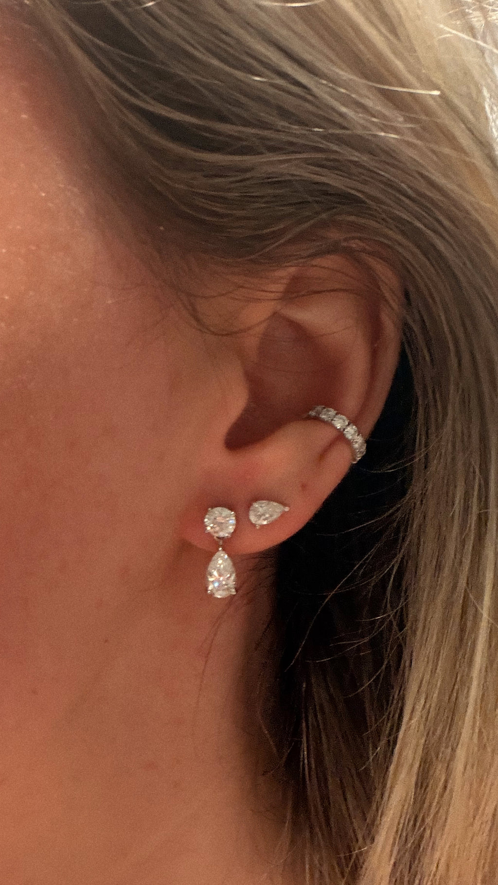 Davey Ear Cuff worn on the upper ear with round, pear and oval earrings.
