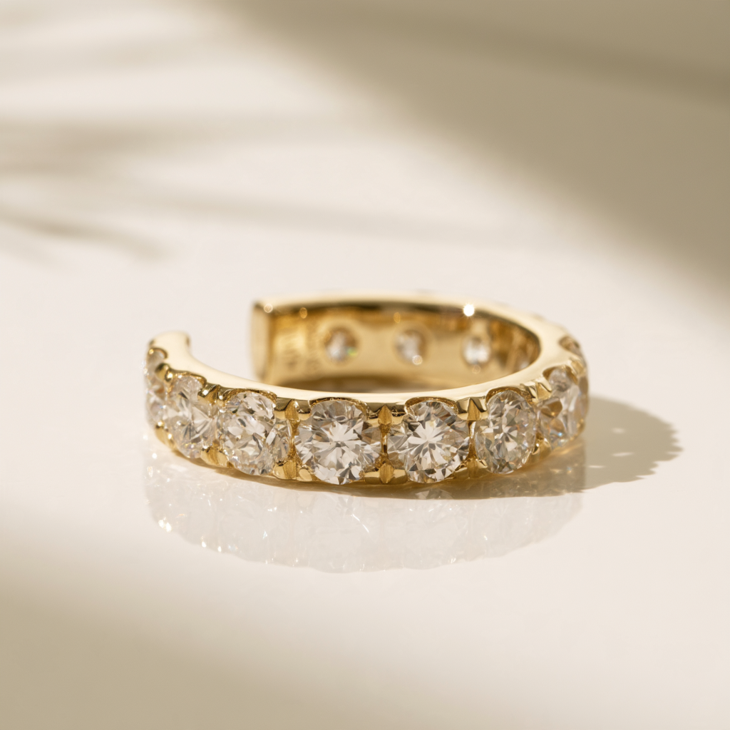 Front view of the Goldie Diamond Ear Cuff in solid 10k yellow gold, showing the round lab-grown diamonds and open cuff design.