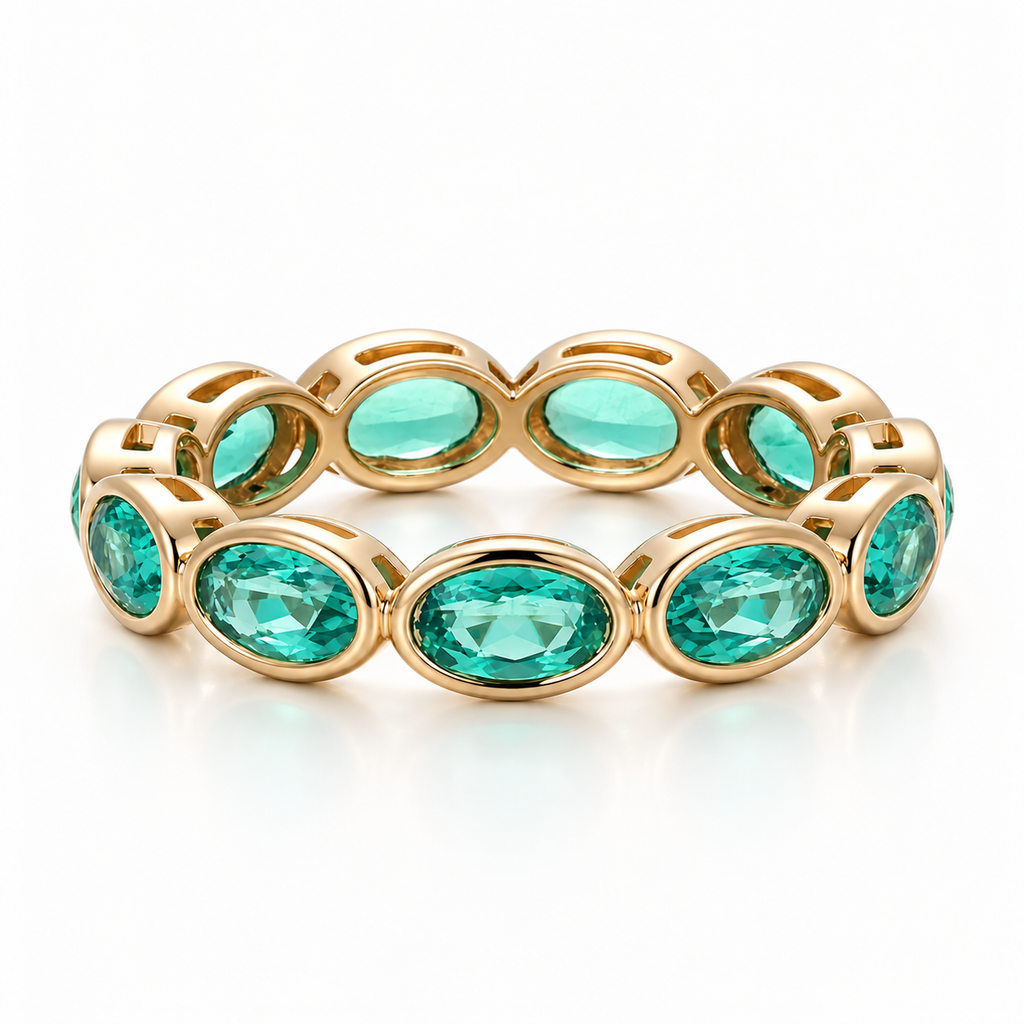 Oval Bezel Eternity Band in yellow gold with green moissanite