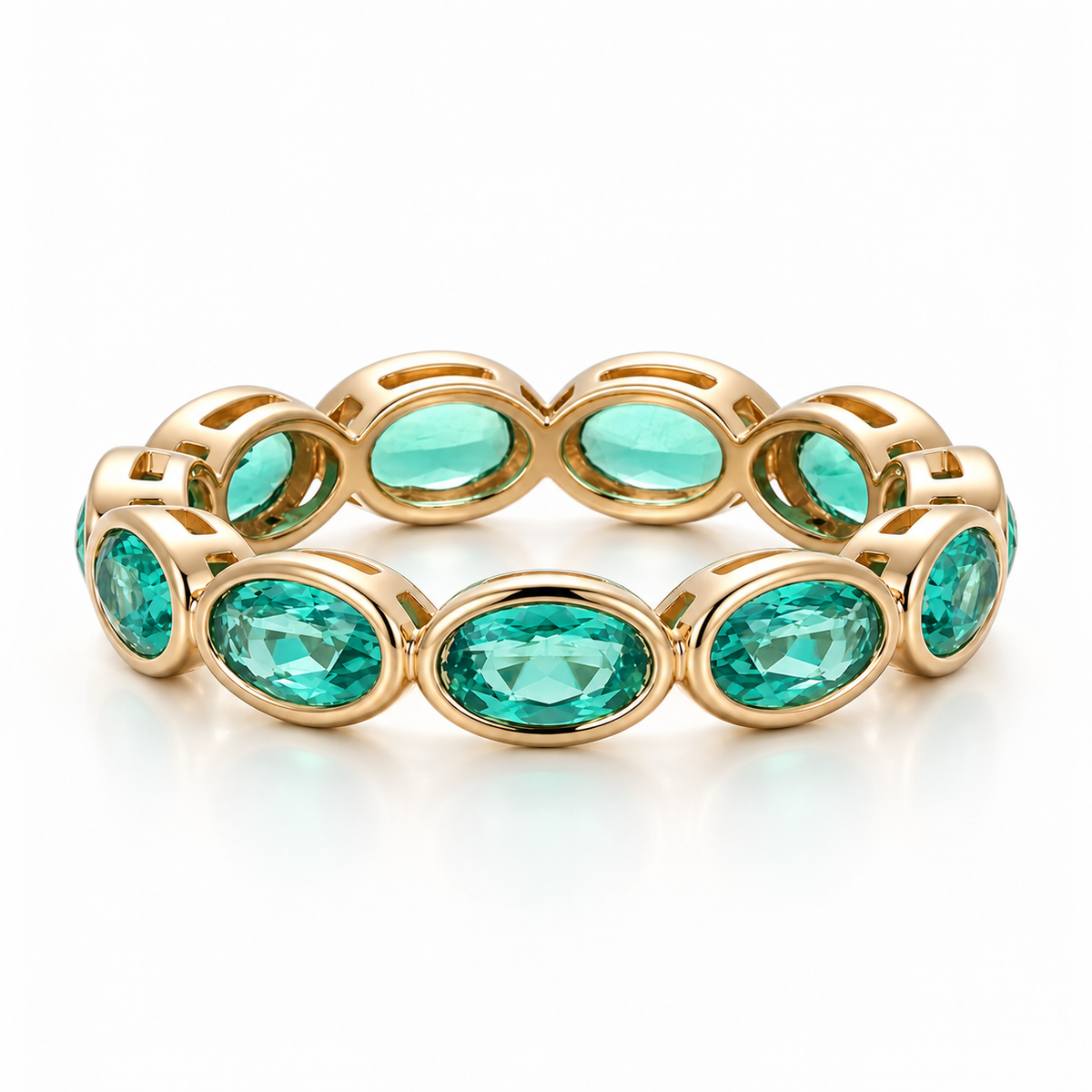 Oval Bezel Eternity Band in yellow gold with green moissanite